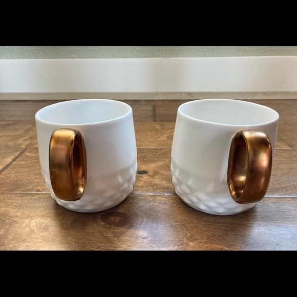 STARBUCKS Pair of (2) White Geometric 12 Oz Bronze Colored Handle Coffee Mugs - Picture 3 of 8